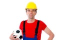 Handcrafter with helmet and soccer ball