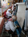 Handcrafting carpets in Tunisia by berber women