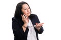 Handcuffed businesswoman taking phone call as illegal concept Royalty Free Stock Photo