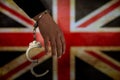 Handcuffed hand in front of the country flag. crime concept Royalty Free Stock Photo