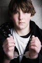 Handcuffed teen portrait