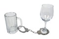 Handcuffs on Beer Mug and Wine Glass