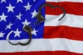 handcuffs on the flag of America, the concept of combating crime, corruption in the USA