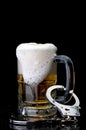 Handcuffs on the handle of a beer mug