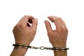 Handcuffs on hands Royalty Free Stock Photo