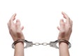 Handcuffs on hands Royalty Free Stock Photo