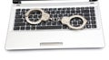 Handcuffs is on the laptop keyboard. Royalty Free Stock Photo