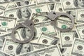 Handcuffs on money background Royalty Free Stock Photo