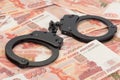 Handcuffs on Russian money