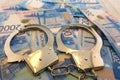 Handcuffs on Russian money shackles steel suspect .