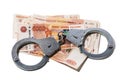 Handcuffs on russian rubles isolated. Concept on the subject of currency fraud