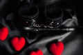 Handcuffs and whip for BDSM sex with red hearts. Royalty Free Stock Photo