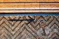 handdrawn arrow pointing to key on doormat