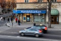 Handelsbanken bank on a street in Stockholm, Sweden with cars driving