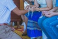 Handfasting. Selective focus on hands of Thai graduation ceremony.