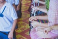 Handfasting. Selective focus on hands of Thai graduation ceremon