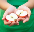 Handful of apples. Woman holding apples in hands Royalty Free Stock Photo