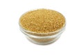 A handful of cane sugar in a glass bowl Royalty Free Stock Photo