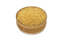A handful of cane sugar in a wooden bowl Royalty Free Stock Photo