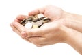 Handful of coins in palm hands Royalty Free Stock Photo