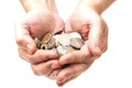 Handful of coins in palm hands Royalty Free Stock Photo
