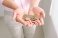Handful of coins in palm male hands Royalty Free Stock Photo