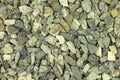 A handful of construction gravel gray background Royalty Free Stock Photo