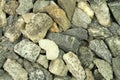 A handful of crushed gravel construction background Royalty Free Stock Photo
