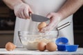 Handful of flour with egg on a rustic kitchen. Against the backg Royalty Free Stock Photo