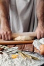 Handful of flour with egg on a rustic kitchen Royalty Free Stock Photo