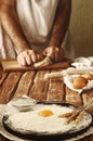 A handful of flour with egg on a rustic kitchen Royalty Free Stock Photo