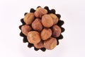 Handful hazelnuts in figured form