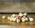 Handful of hazelnuts on wooden table