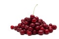 Handful of a red cherry on a white background
