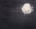 A handful of rice a wooden background border,with text area Royalty Free Stock Photo
