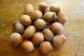 Handful of ripe hazelnuts on table Royalty Free Stock Photo