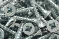 A handful of shiny anodized screws Royalty Free Stock Photo