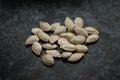 A handful of uncooked pumpkin seeds