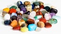 Handful of various gem stones on white Royalty Free Stock Photo