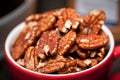 Handful of walnuts in a cup