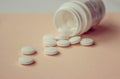 A handful of white large tablets, vitamins for health