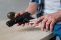 Handgun being in hands of a young girl