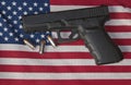 Handgun, bullets and the American flag Royalty Free Stock Photo