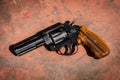 Handgun on the concrete red backgroound Royalty Free Stock Photo