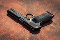Handgun on the concrete red backgroound Royalty Free Stock Photo