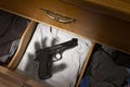 Handgun in dresser drawer