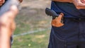 Handgun in gun holster in man pocket Royalty Free Stock Photo