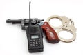 Handgun and Handcuff with Police Radio communication