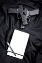 Handgun and notebook