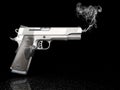 Handgun with smoke